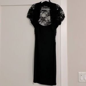 Jersey knit bodycon dress with lace sleeves and back. Hits at knee on 5’2”.